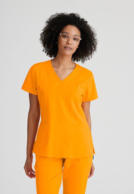 Zdravotnícke oblečenie - Dámske zdravotnícke blúzy - Dámska zdravotnícka blúza RACER TOP - oranžová | medical-uniforms